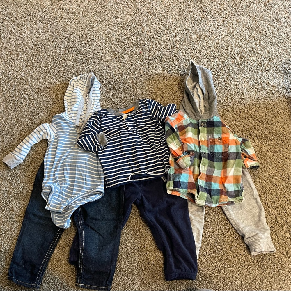 3 Boys Shirts and 3 Pairs of Pants - 12 Months and from Carter’s.